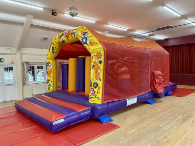 Carnival Obstacle Section, a assault course for hire from Jumping Jacks Bouncy Castles