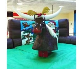Rodeo Rudolph Reindeer Hire Surrey, a inflatable game for hire from Alpha Bouncy Castles & Events