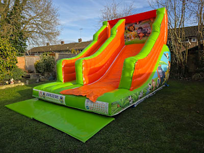 15ft x 15ft x 6ft Platform Jungle Slide, a inflatable slide for hire from MLM Bouncy Castles