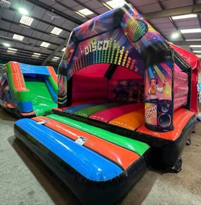 15 x 15 adults disco castle, a bouncy castle for hire from Bounce About Sussex