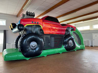 Monster Truck Fun Run (10ft x 28ft), a assault course for hire from Elmbridge Inflatables