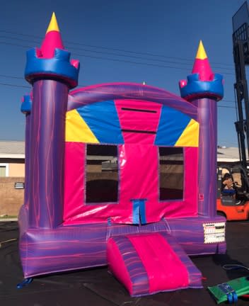 13 by 13 Razzle Dazzle Castle bounce house rental for a Lake Elsinore party