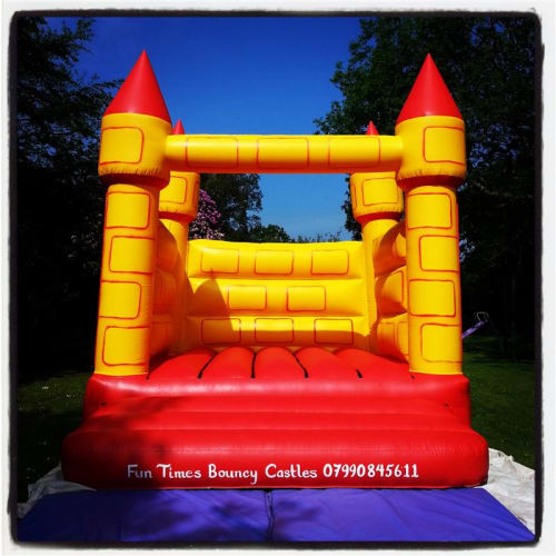 Yellow & Red Camelot Turret Bouncy Castle (15ft x 15ft)
