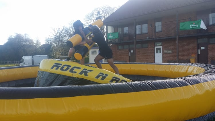 Rock and Roll Gladiator Duel inflatable game hire East Sussex