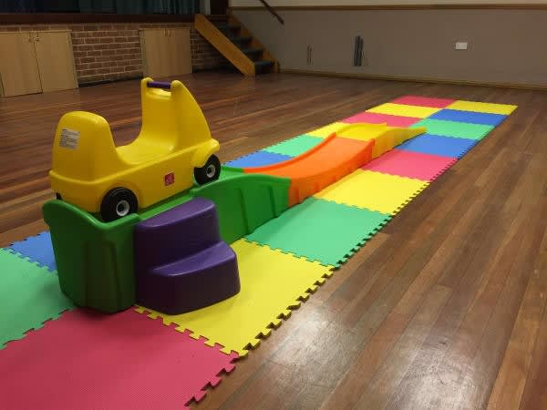 Up and Down Roller Coaster Bouncy Castle Hire in Gravesend