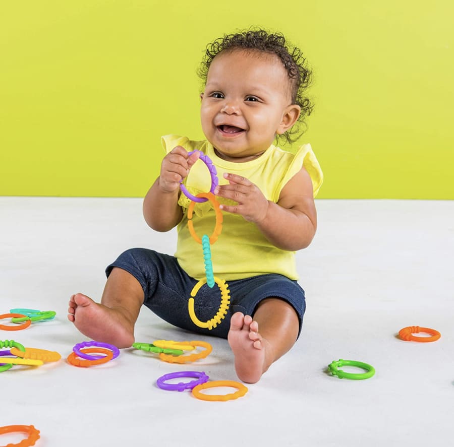 Baby playing cheap toys online