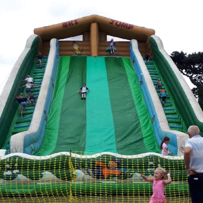 Bouncy castle deals with slide