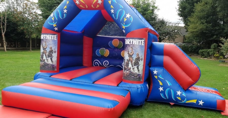 red blue fortnite slide castle - fortnite bouncy castle hire