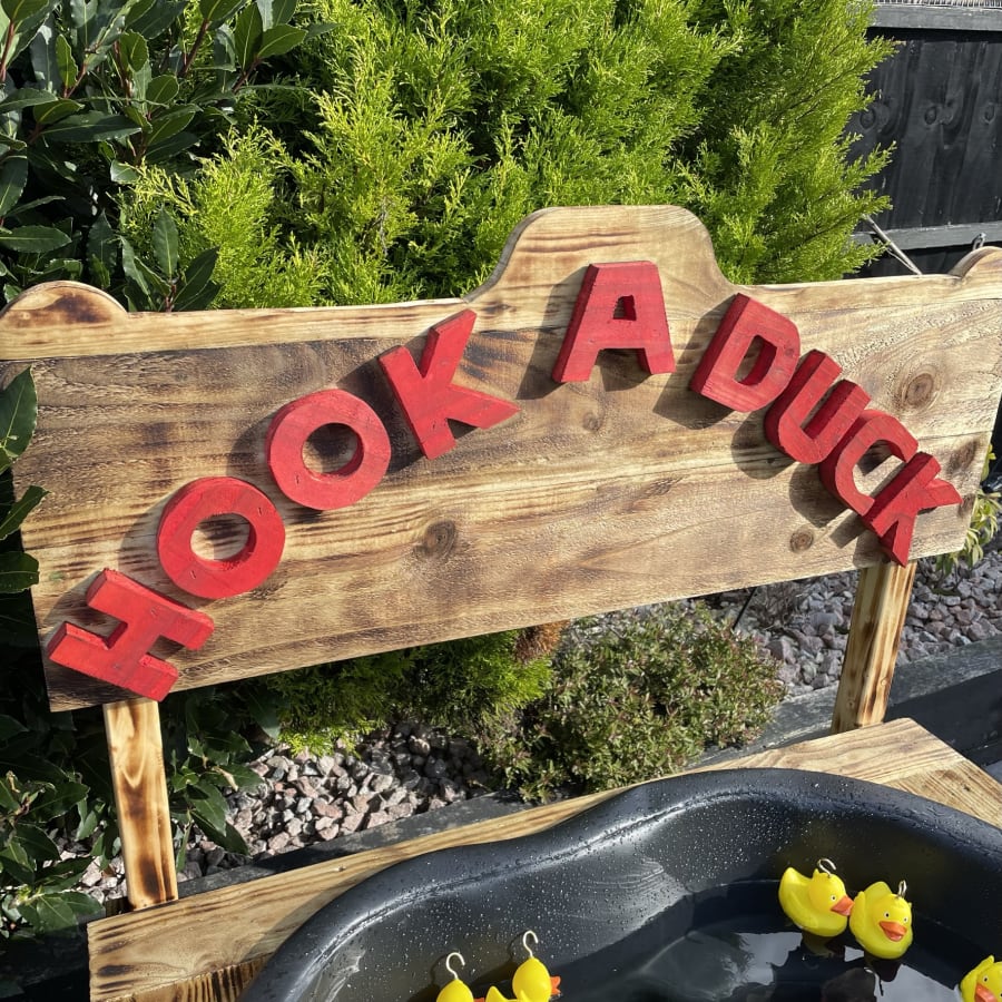 Giant Wooden Hook a Duck Game - Bouncy Castle Hire in Essex