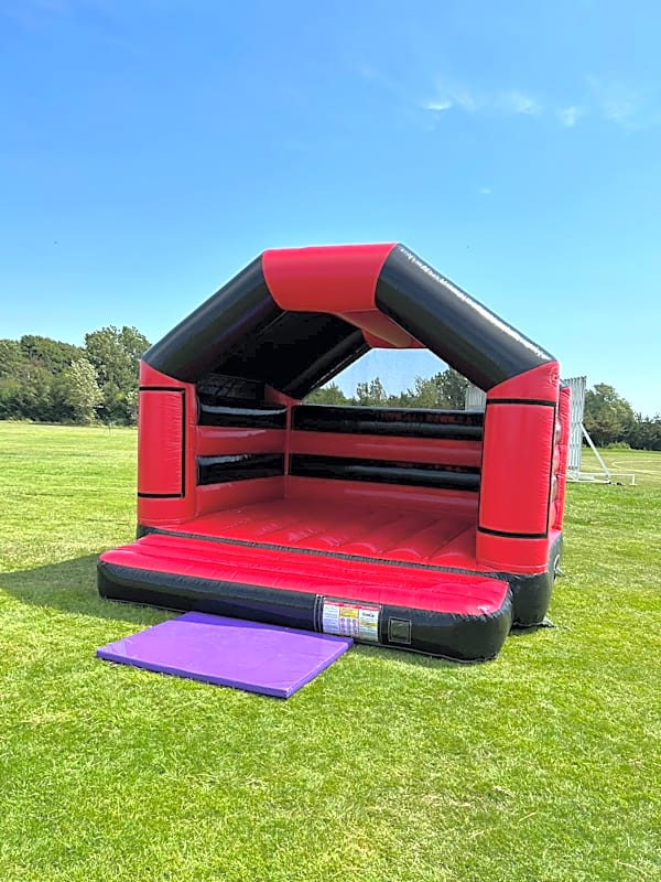 Adult Bouncy Castle Hire - Red and Black With Roof – photo 5