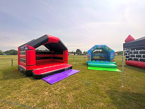 Adult Bouncy Castle Hire - Red and Black With Roof – photo 4