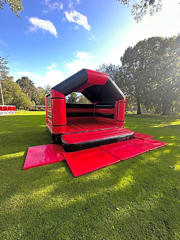 Adult Bouncy Castle Hire - Red and Black With Roof – photo 8