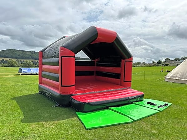 Adult Bouncy Castle Hire - Red and Black With Roof – photo 6