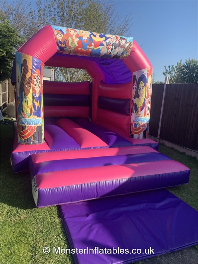 Superhero Girls Themed Pink Bouncy Castle Bouncy Castle Soft Play Hire In Chelmsford Maldon Southend Rayleigh Billericay Brentwood Braintree